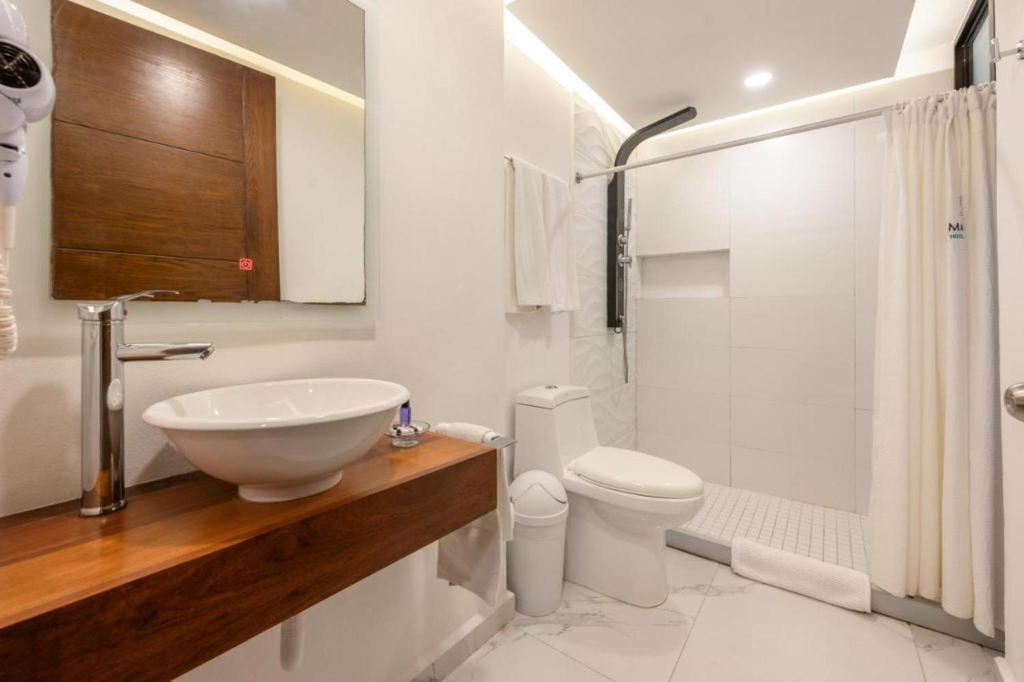Collection O Hotel Marvic بلايا ديل كارمن المظهر الخارجي الصورة